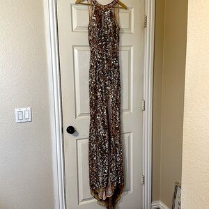 Beautiful prom dress in rose gold with side slit and draped backline, no tears.